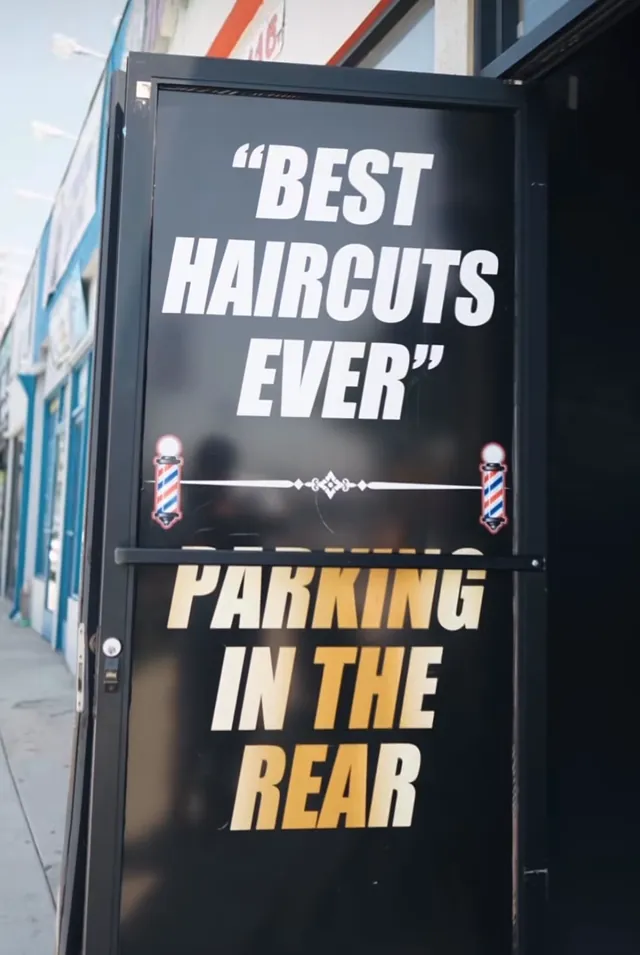 The sign on the Pharaohs door: Best haircuts ever, parking in the rear